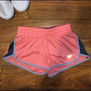 Nike Dri-FIT running shorts in Coral